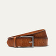 Will Leather Goods Wood Grain Embossed Belt coiled on a white background, tan leather with a fine wood-grain embossed texture and a brushed silver rectangular buckle.