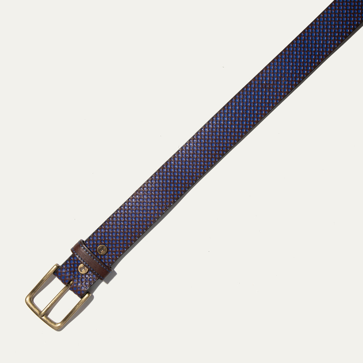 Close-up of the brown and blue diamond-embossed leather belt strap showing the two-tone pattern.