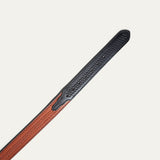 Close-up of the black-to-chestnut two-tone basketweave belt strap tip end with adjustment holes.