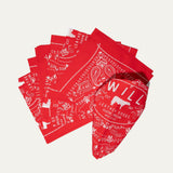 Several red paisley Will's Bandanas fanned out to show the folded stack and logo corner detail.