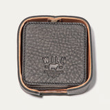 Open round leather holder for the Set of Eight Coasters in black pebbled leather, showing the embossed WILL logo, on a white background.