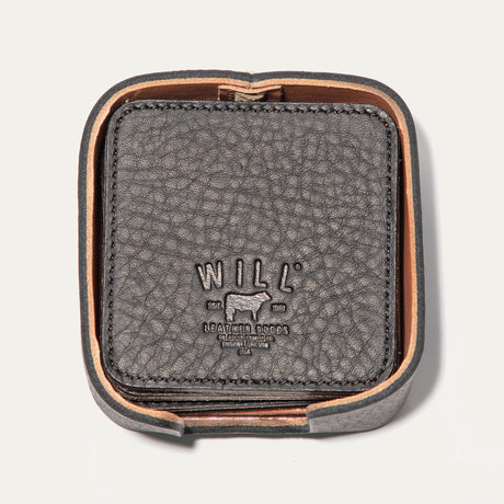 Open round leather holder for the Set of Eight Coasters in black pebbled leather, showing the embossed WILL logo, on a white background.