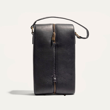 Will Leather Goods Hard Double Leather Wine Case in black pebbled leather, side view with carry handle and zip-around closure, on a white background.