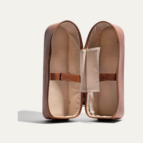 Will Leather Goods Hard Double Leather Wine Case in tan leather, unzipped and opened flat showing the empty interior with fabric lining and two elastic bottle straps.