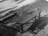 Deserted beach chair, quiet coast vibes, windswept scene, peaceful solitude, Canvas Print, hallway decor, rustic retreat outdoor artwork