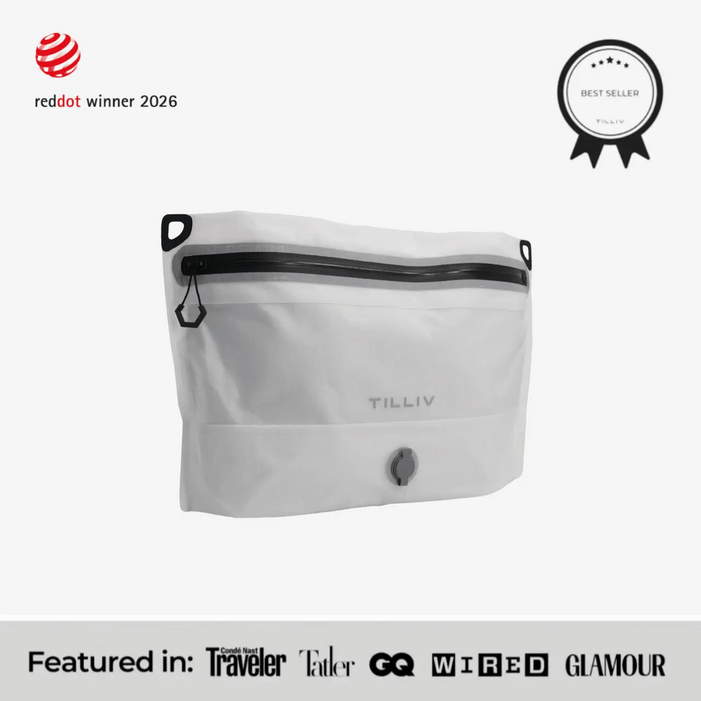TILLIV Compak Medium in Digital White seen at an angle, carrying a Best Seller badge and a strip reading Featured in Conde Nast Traveler, Tatler, GQ, WIRED and GLAMOUR
