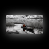 Solitary Canoe, Peaceful Waters, Cloudy Sky, Red Shirt, Framed Canvas Print, Nature Explorer Gift, Cabin Wall Art, Rustic Fall Scene