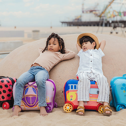 Kids Ride on Luggage From Heys