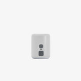 Back of the TILLIV Nano Pump showing the power button and the charging port below it