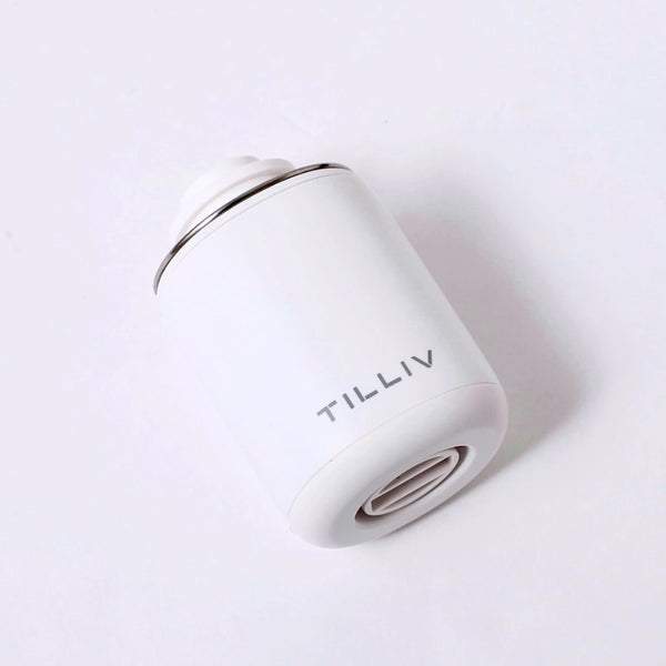 TILLIV Nano Pump seen at an angle, showing the ribbed outlet on its base and the chrome rim at the top