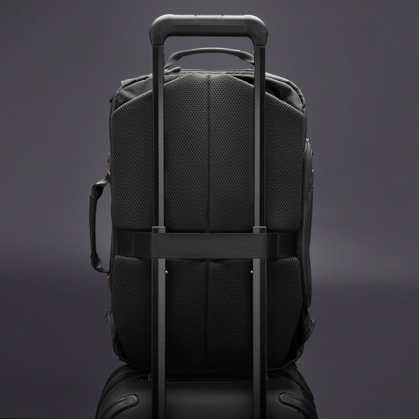 Briggs & Riley ZDX Large Convertible Backpack/Duffle in Black - Slip-Through Strap on a Rolling Suitcase Handle