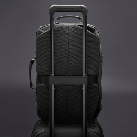 Briggs & Riley ZDX Large Convertible Backpack/Duffle in Black - Slip-Through Strap on a Rolling Suitcase Handle