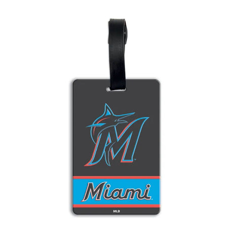 An official Miami Marlins luggage tag featuring the teal and red marlin 'M' logo and 'Miami' script wordmark on a black background with a black hanging strap. MLB PVC Luggage Bag Tag